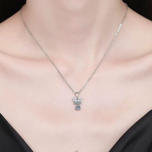 Star Cross Moissanite Pendant Necklace with Cubic Zirconia in Platinum-Plated S925 Sterling Silver worn on neckline by model