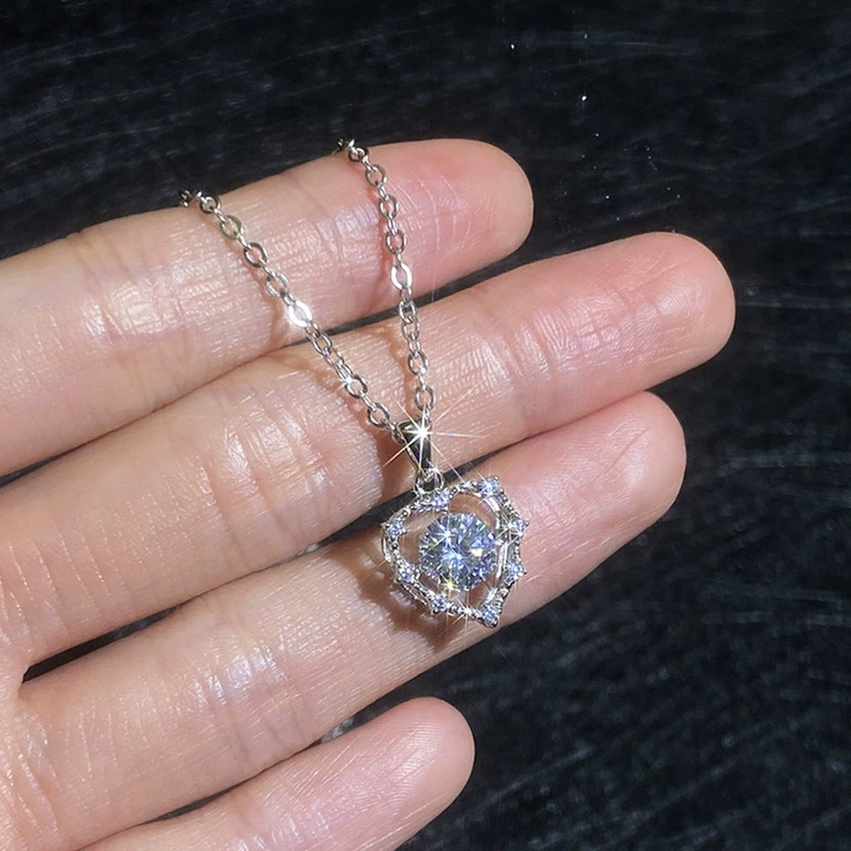 Round Halo Moissanite Pendant Necklace with Cubic Zirconia in Platinum-Plated S925 Sterling Silver worn on neckline by model