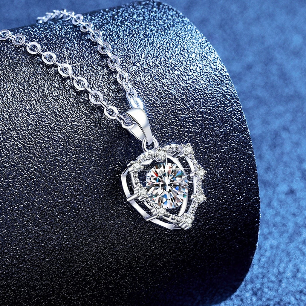 Round Halo Moissanite Pendant Necklace with Cubic Zirconia in Platinum-Plated S925 Sterling Silver blue background angled view