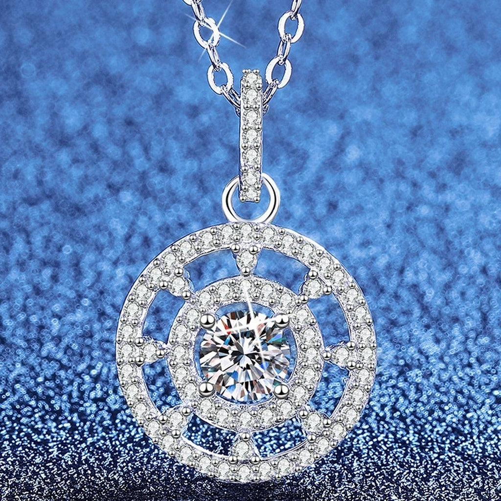 Compass Halo Moissanite Pendant Necklace with Cubic Zirconia in Platinum-Plated S925 Sterling Silver blue background angled view