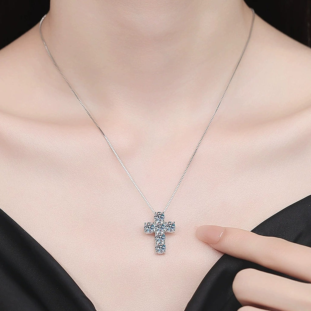 Cross Moissanite Pendant Necklace in Platinum-Plated S925 Sterling Silver worn on neckline by model