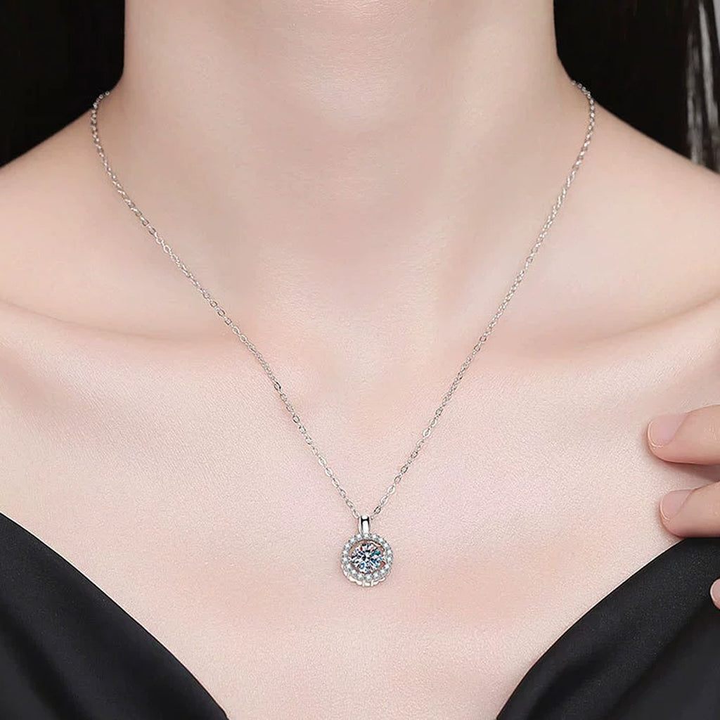 Round Halo Moissanite Pendant Necklace with Cubic Zirconia in Platinum-Plated S925 Sterling Silver worn on neckline by model