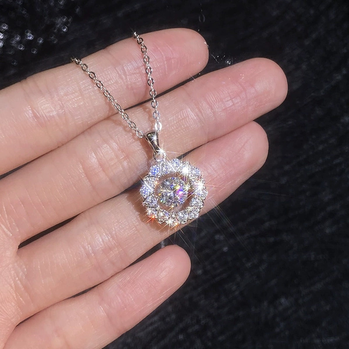 Floral Halo Moissanite Pendant Necklace with Cubic Zirconia in Platinum-Plated S925 Sterling Silver worn on neckline by model