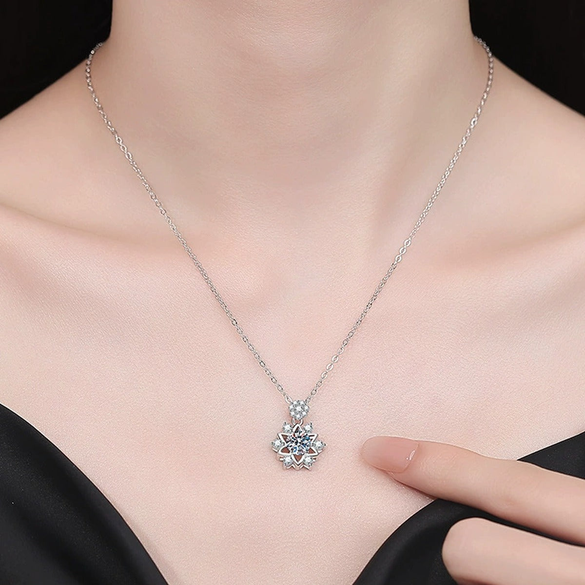 Starburst Moissanite Pendant Necklace with Cubic Zirconia in Platinum-Plated S925 Sterling Silver worn on neckline by model