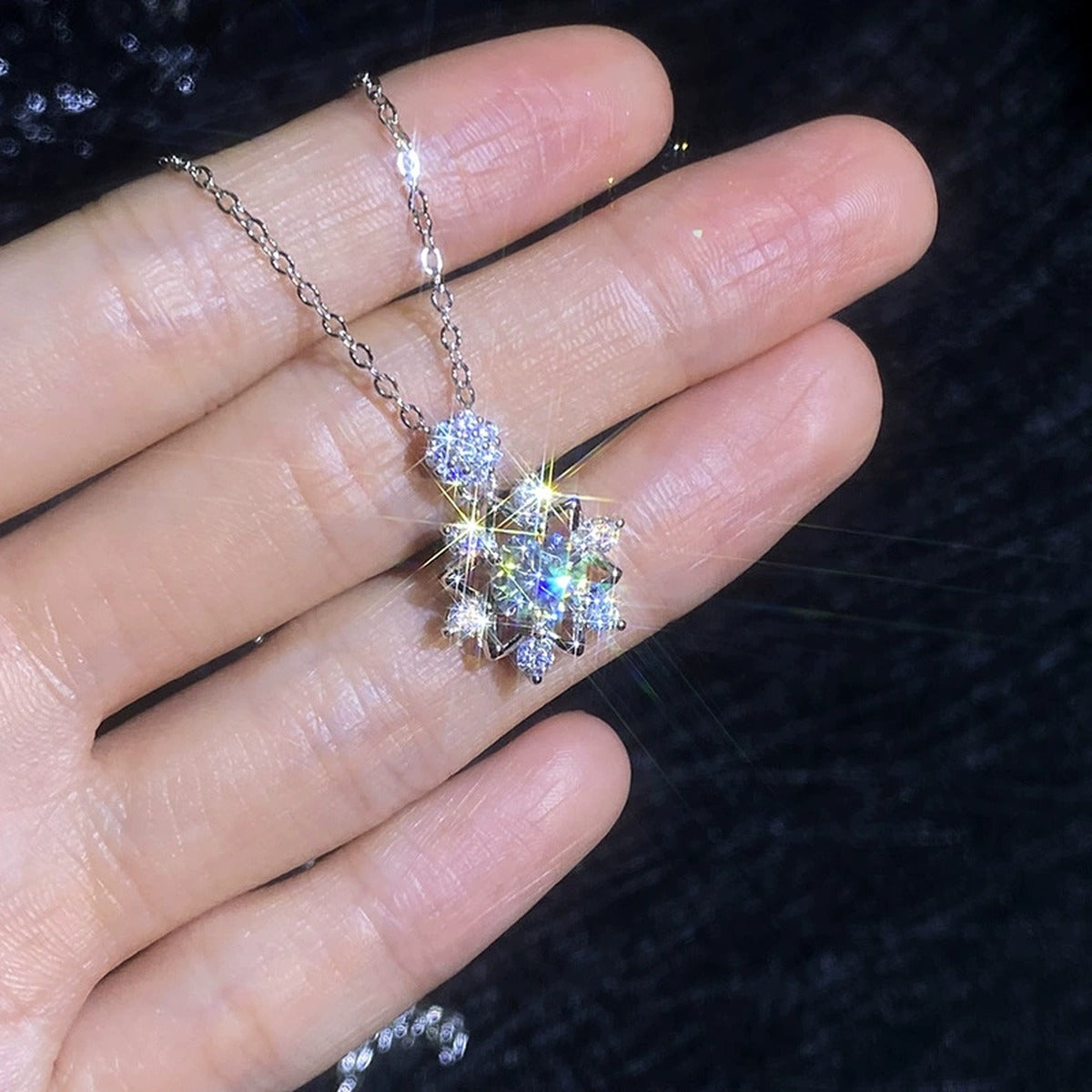 Starburst Moissanite Pendant Necklace with Cubic Zirconia in Platinum-Plated S925 Sterling Silver worn on neckline by model