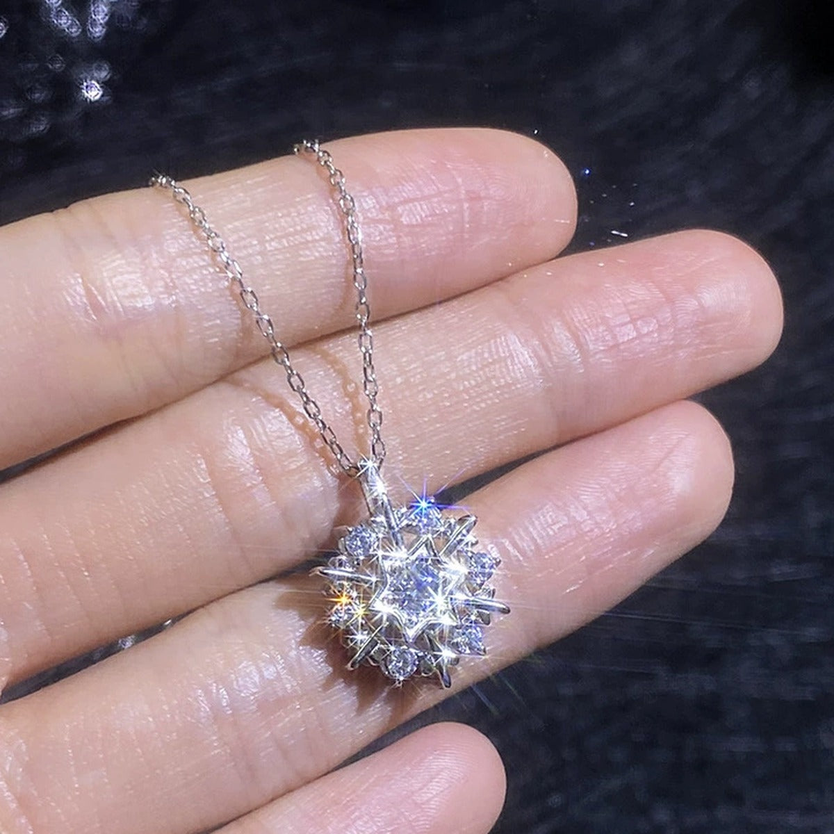 Snowflake Moissanite Pendant Necklace with Cubic Zirconia in Platinum-Plated S925 Sterling Silver worn on neckline by model