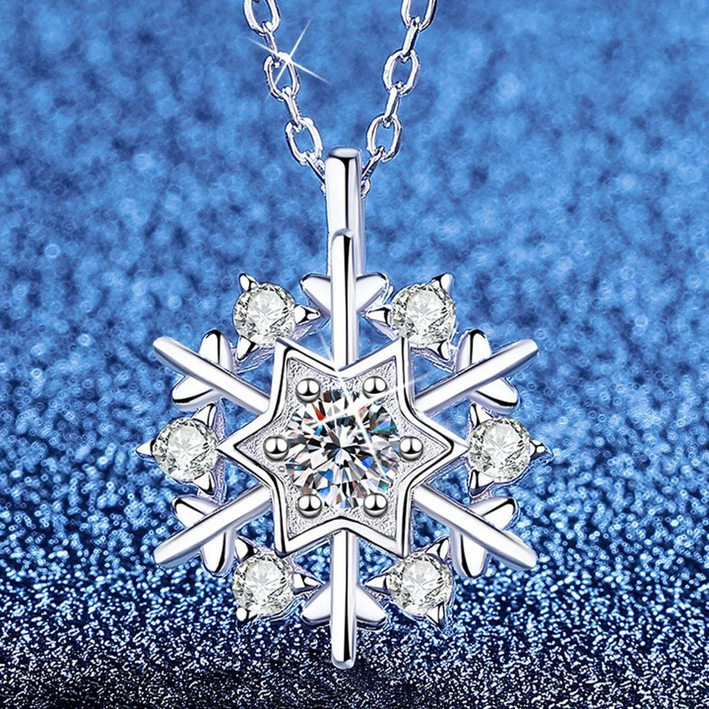 Snowflake Moissanite Pendant Necklace with Cubic Zirconia in Platinum-Plated S925 Sterling Silver blue background angled view