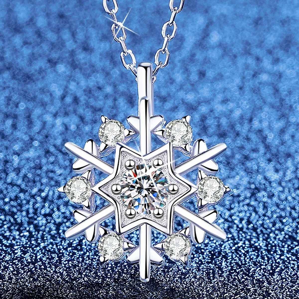 Snowflake Moissanite Pendant Necklace with Cubic Zirconia in Platinum-Plated S925 Sterling Silver blue background angled view