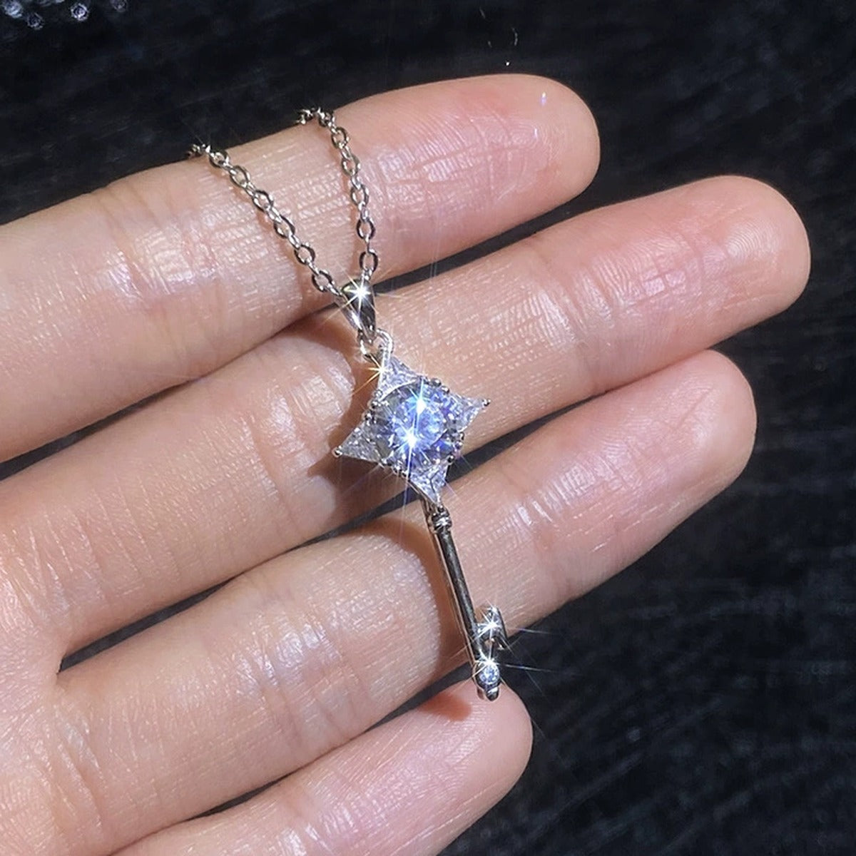 Kite Halo Moissanite Pendant Necklace with Cubic Zirconia in Platinum-Plated S925 Sterling Silver worn on neckline by model