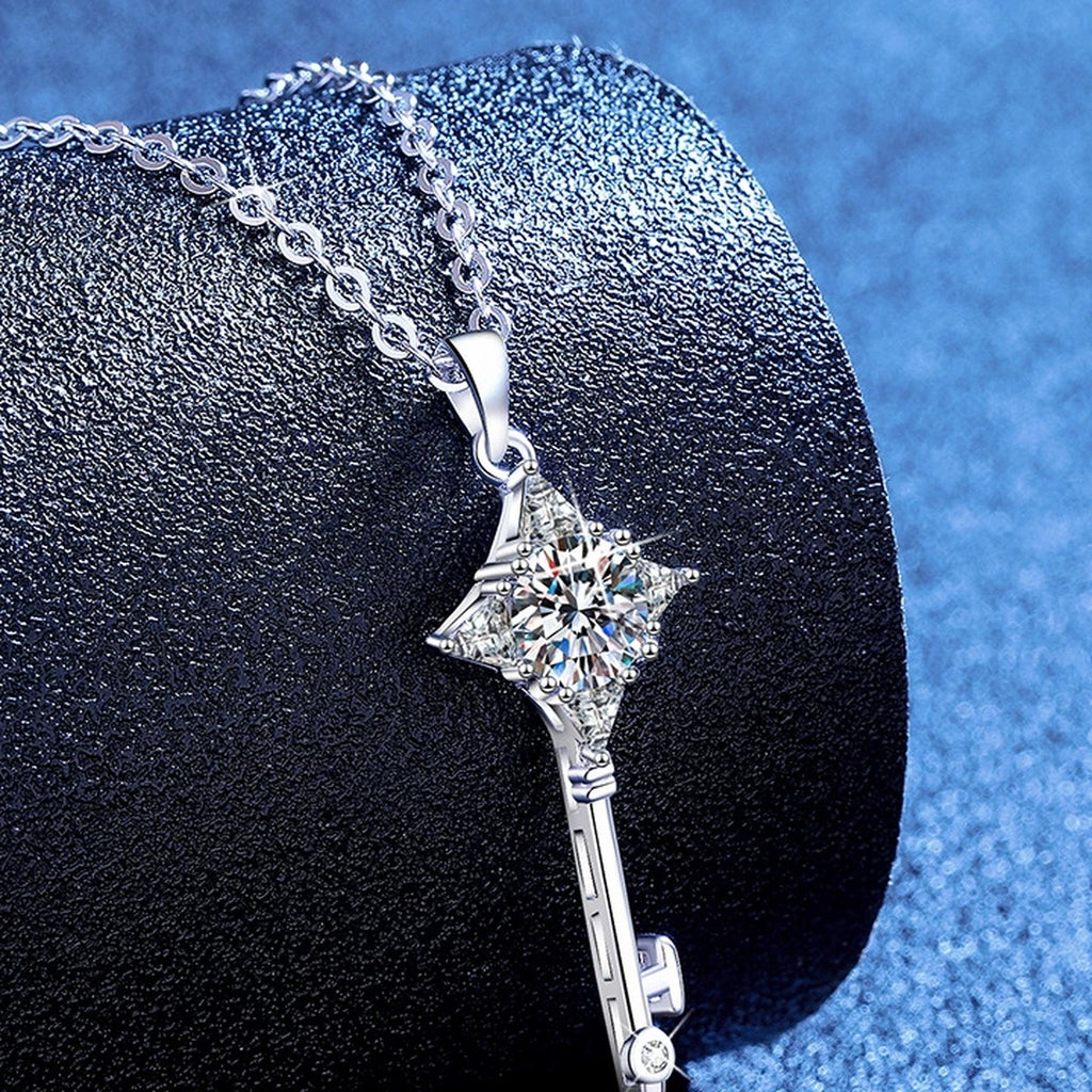 Kite Halo Moissanite Pendant Necklace with Cubic Zirconia in Platinum-Plated S925 Sterling Silver blue background angled view