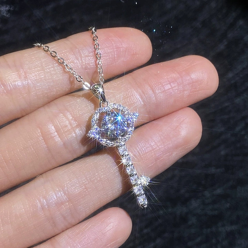 Linear Drop Moissanite Pendant Necklace with Cubic Zirconia in Platinum-Plated S925 Sterling Silver worn on neckline by model
