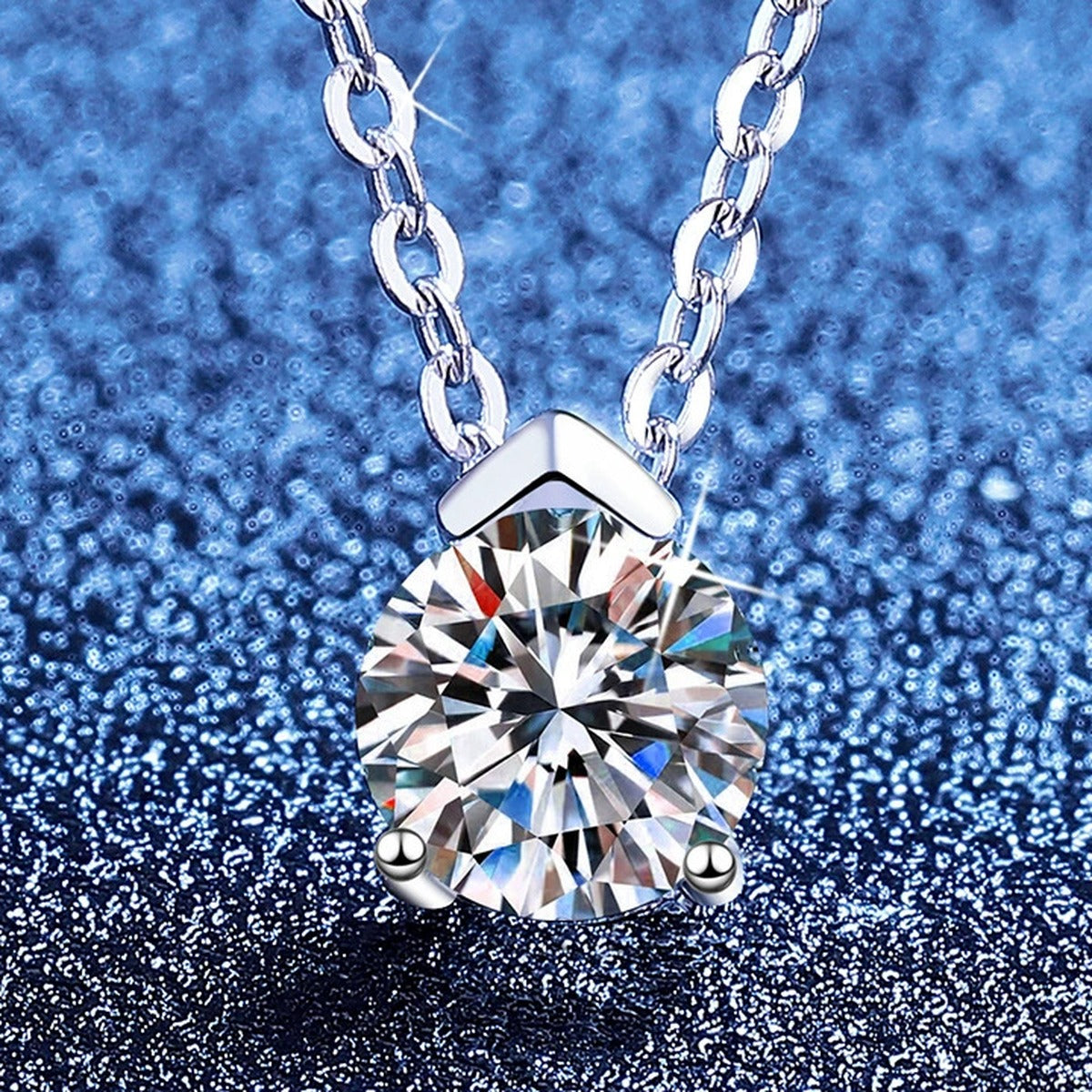 Solitaire Moissanite Collar Necklace in S925 Sterling Silver blue background styling view