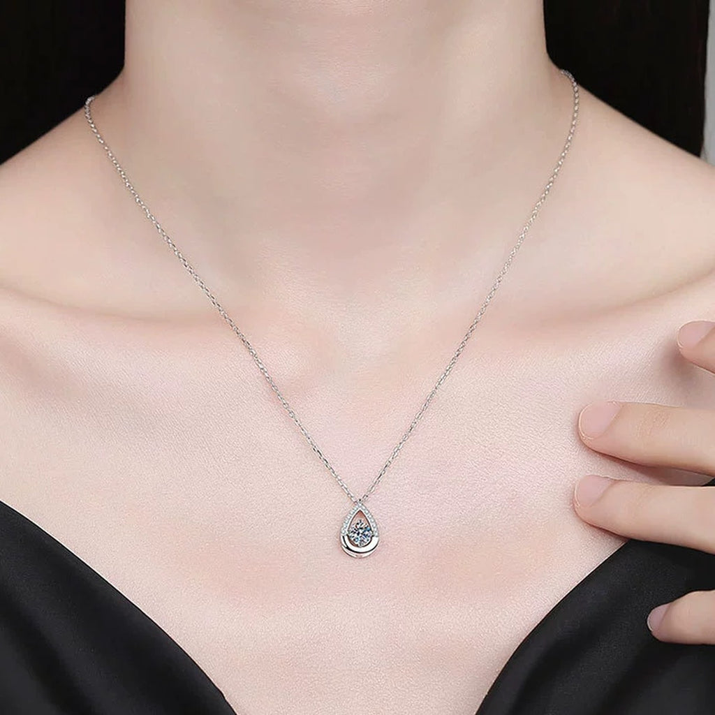 Teardrop Moissanite Pendant Necklace with Cubic Zirconia in Platinum-Plated S925 Sterling Silver worn on neckline by model