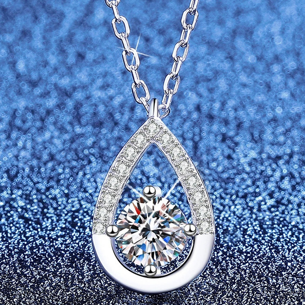 Teardrop Moissanite Pendant Necklace with Cubic Zirconia in Platinum-Plated S925 Sterling Silver blue background product view
