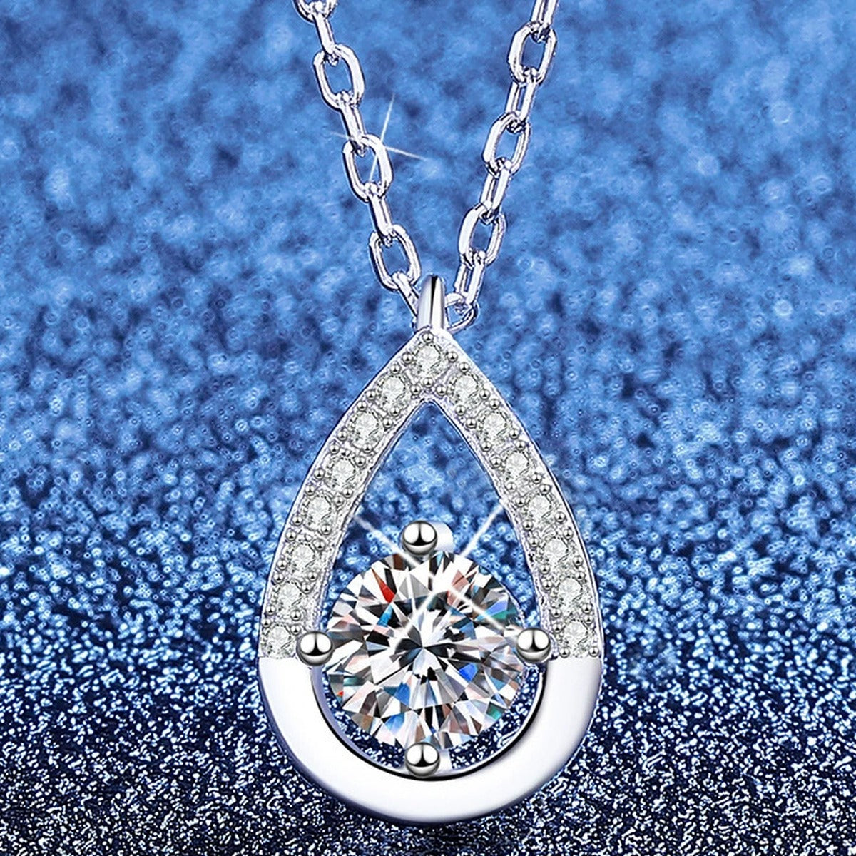 Teardrop Moissanite Pendant Necklace with Cubic Zirconia in Platinum-Plated S925 Sterling Silver blue background product view