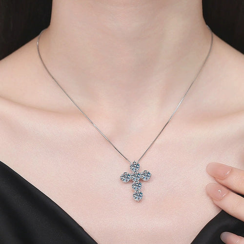Cross Moissanite Pendant Necklace in Platinum-Plated S925 Sterling Silver worn on neckline by model