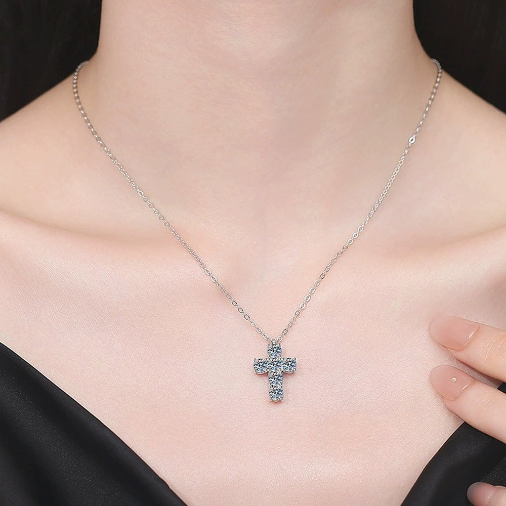 Cross Moissanite Pendant Necklace in Platinum-Plated S925 Sterling Silver worn on neckline by model