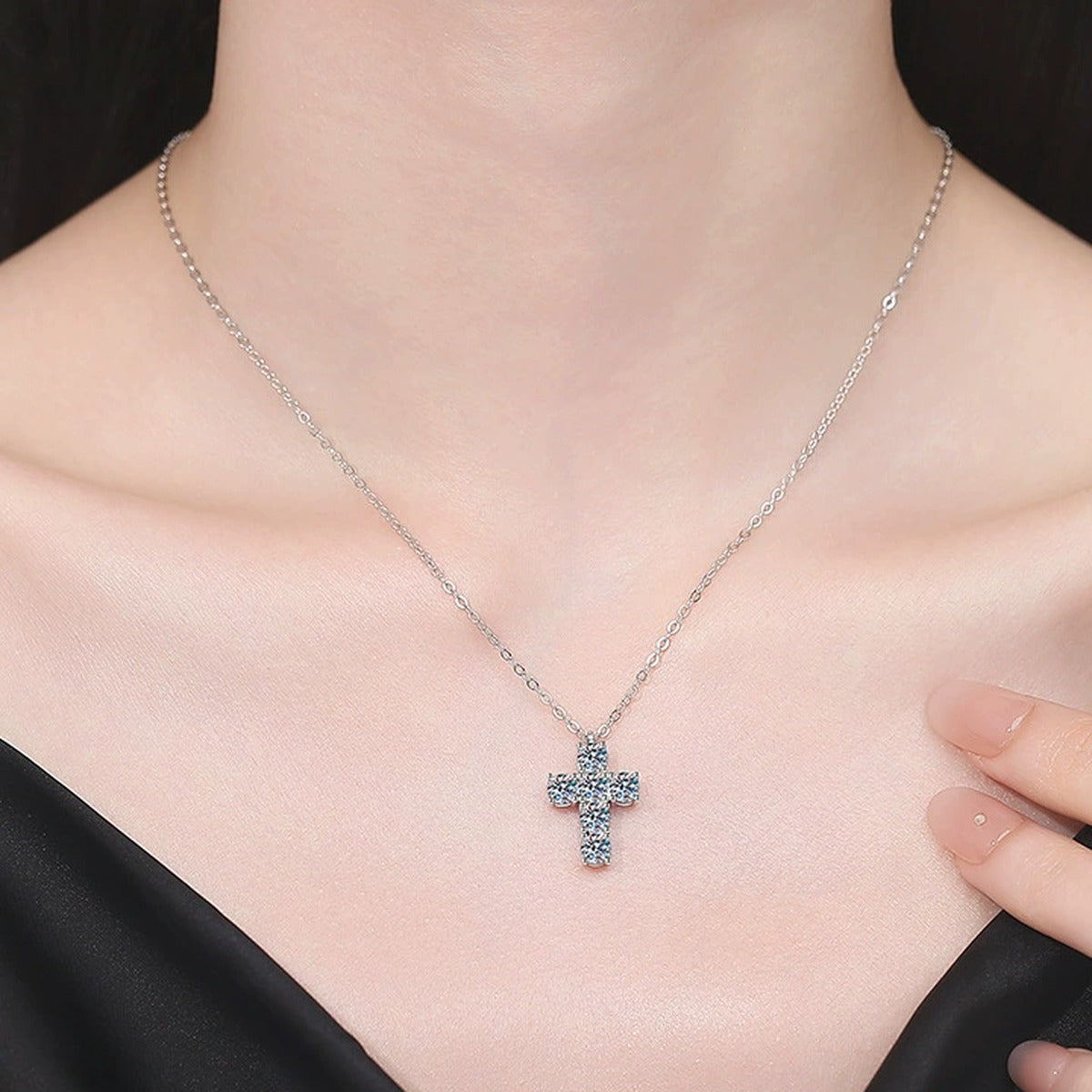 Cross Moissanite Pendant Necklace in Platinum-Plated S925 Sterling Silver worn on neckline by model