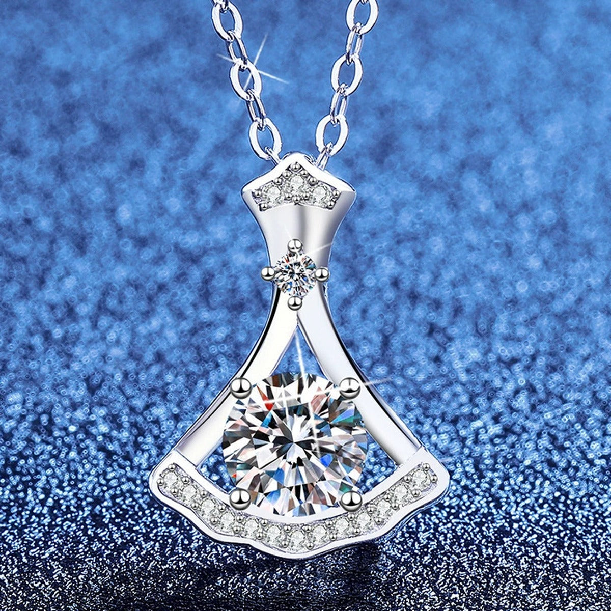Fan Moissanite Pendant Necklace with Cubic Zirconia in Platinum-Plated S925 Sterling Silver blue background angled view