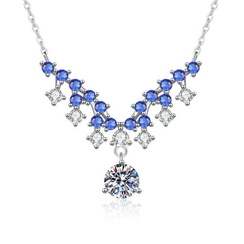Blue Accent Graduated Moissanite Drop Necklace with Cubic Zirconia in Platinum-Plated S925 Sterling Silver on clean white background showing the graduated drop necklace with blue accent stones and a round moissanite drop