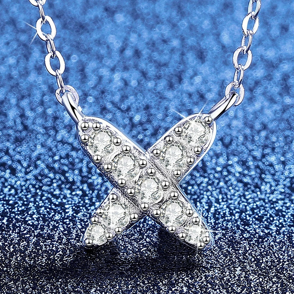 X Motif Moissanite Pendant Necklace in Platinum-Plated S925 Sterling Silver blue background product view