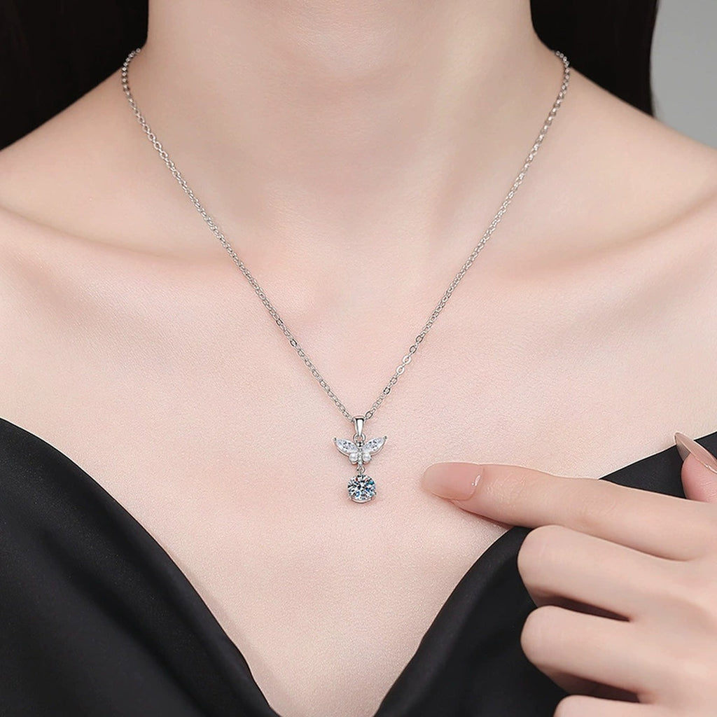Wing Pearl Moissanite Pendant Necklace with Cubic Zirconia in Platinum-Plated S925 Sterling Silver worn on neckline by model
