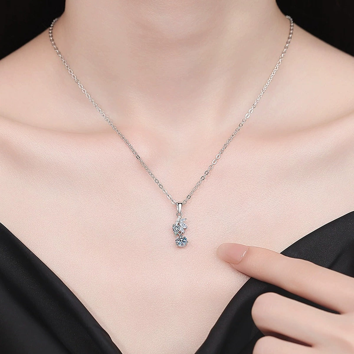Leaf Pearl Moissanite Pendant Necklace with Cubic Zirconia in Platinum-Plated S925 Sterling Silver worn on neckline by model