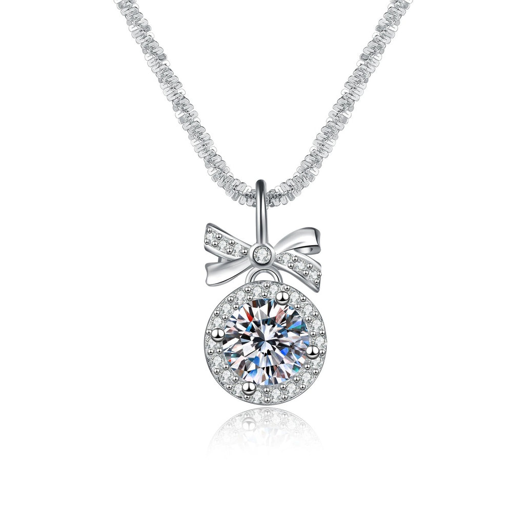 Bow Moissanite Pendant Necklace with Cubic Zirconia in Platinum-Plated S925 Sterling Silver on clean white background showing the bow pendant framing a round moissanite center with cubic zirconia accents