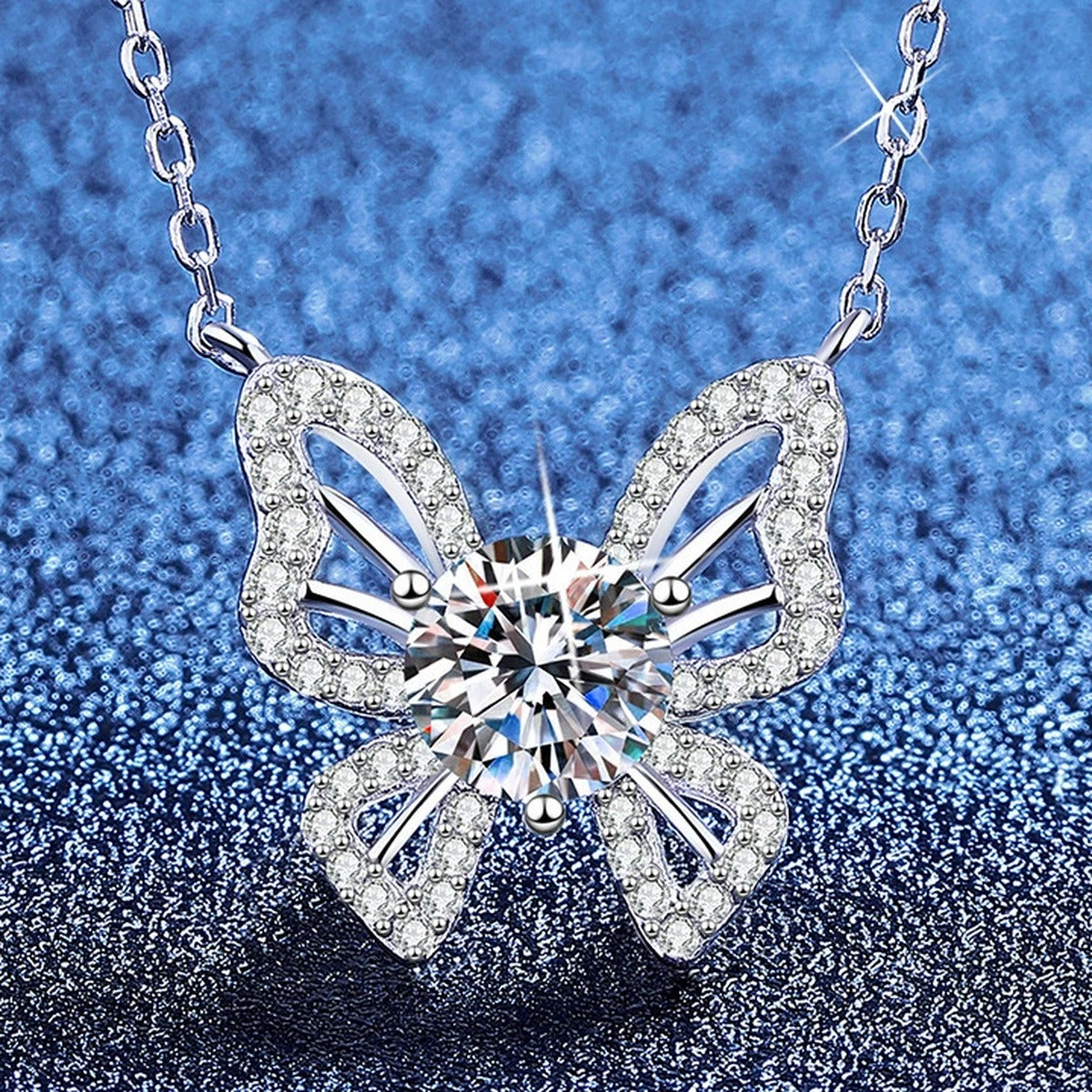 Butterfly Moissanite Pendant Necklace with Cubic Zirconia in Platinum-Plated S925 Sterling Silver blue background product view