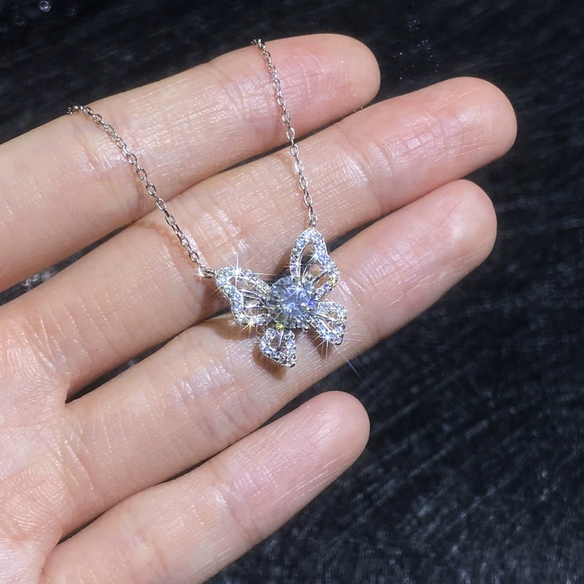 Butterfly Moissanite Pendant Necklace with Cubic Zirconia in Platinum-Plated S925 Sterling Silver close-up product detail view