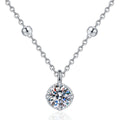 Solitaire Moissanite Pendant Necklace in Platinum-Plated S925 Sterling Silver on clean white background showing the minimal solitaire pendant with a round moissanite center