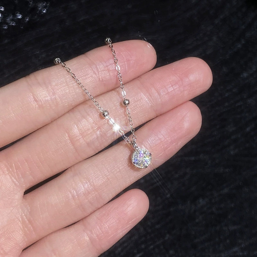 Solitaire Moissanite Pendant Necklace in Platinum-Plated S925 Sterling Silver close-up product detail view