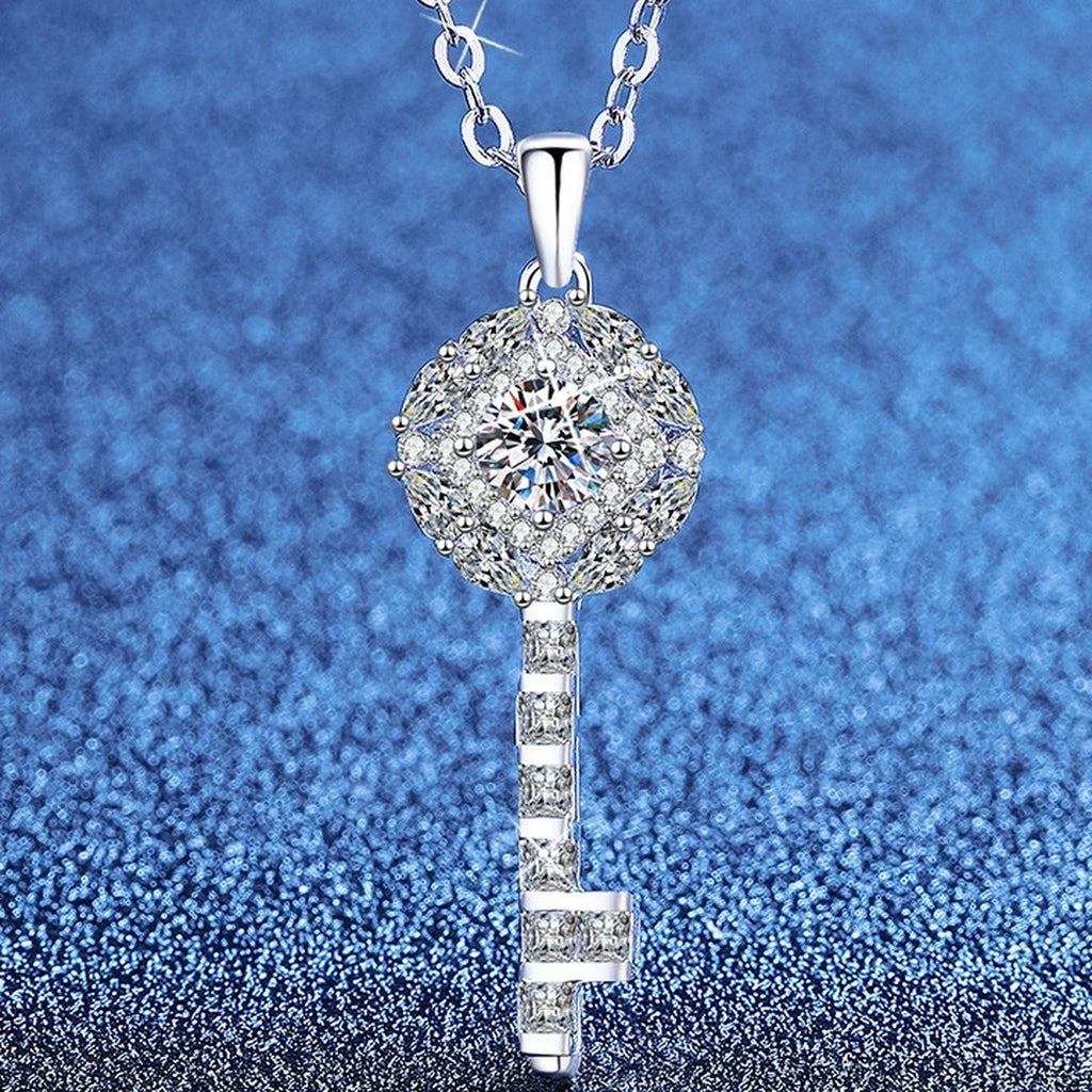 Key Moissanite Pendant Necklace with Cubic Zirconia in Platinum-Plated S925 Sterling Silver blue background angled view