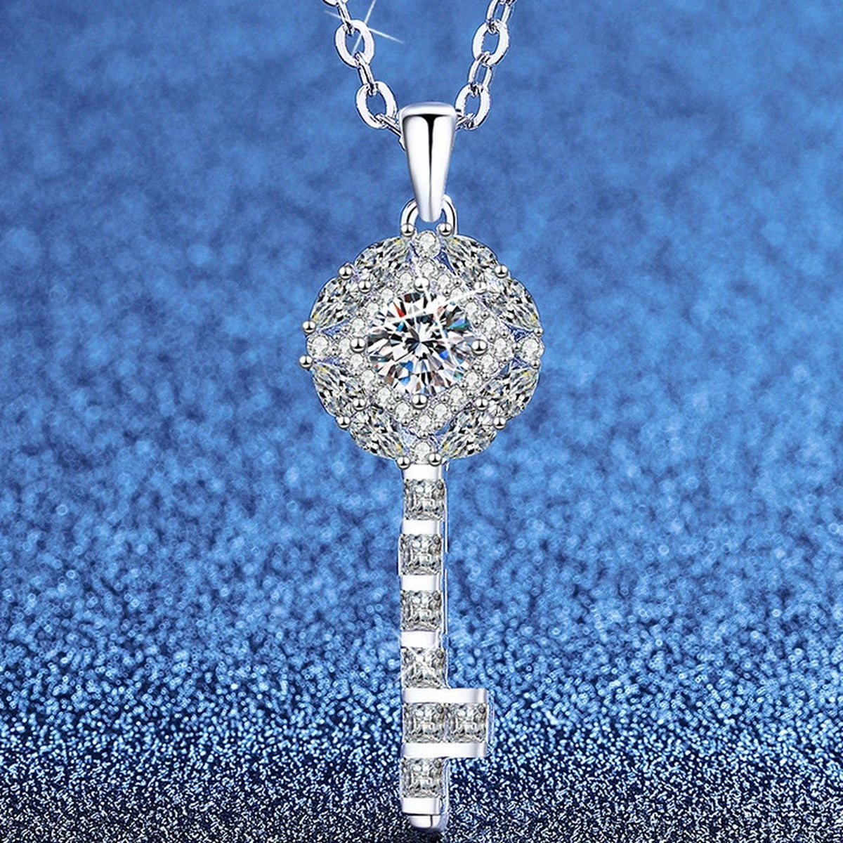 Key Moissanite Pendant Necklace with Cubic Zirconia in Platinum-Plated S925 Sterling Silver blue background angled view