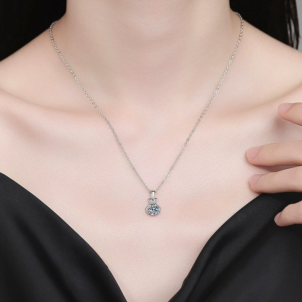 Pineapple Moissanite Pendant Necklace with Cubic Zirconia in Platinum-Plated S925 Sterling Silver worn on neckline by model