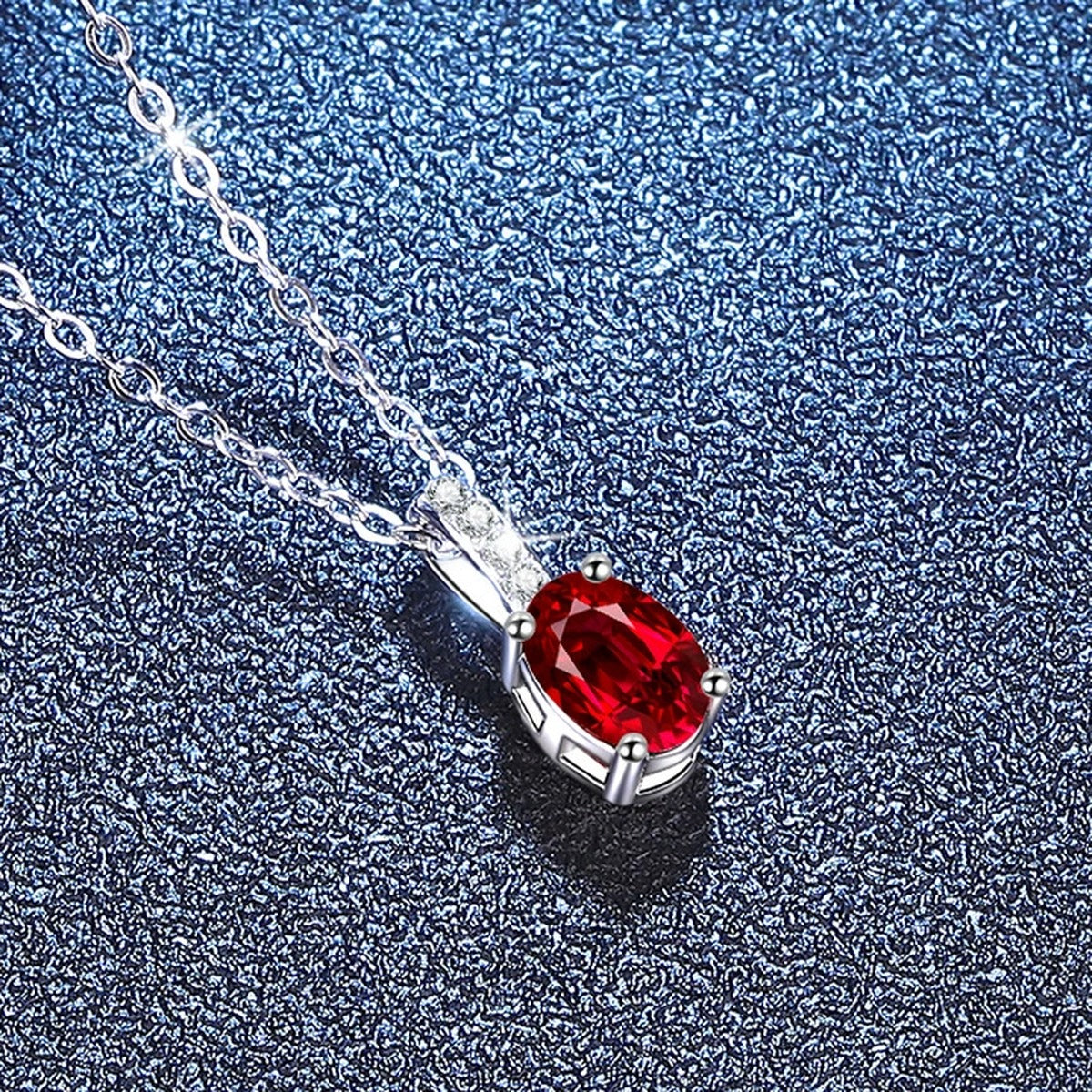 Oval Lab-Grown Gemstone and Moissanite Drop Necklace in White Gold-Plated S925 Sterling Silver blue background product view