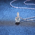Oval Lab-Grown Gemstone and Moissanite Drop Necklace in White Gold-Plated S925 Sterling Silver blue background close-up view