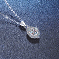 Oval Halo Lab-Grown Gemstone and Moissanite Pendant Necklace in White Gold-Plated S925 Sterling Silver blue background angled view