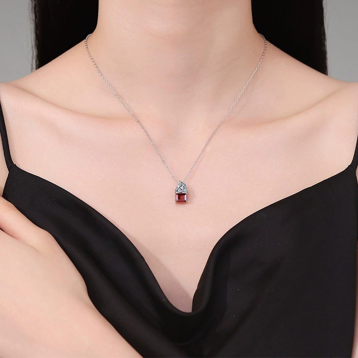 Heart Moissanite and Lab-Grown Gemstone Pendant Necklace in White Gold-Plated S925 Sterling Silver worn on neckline by model