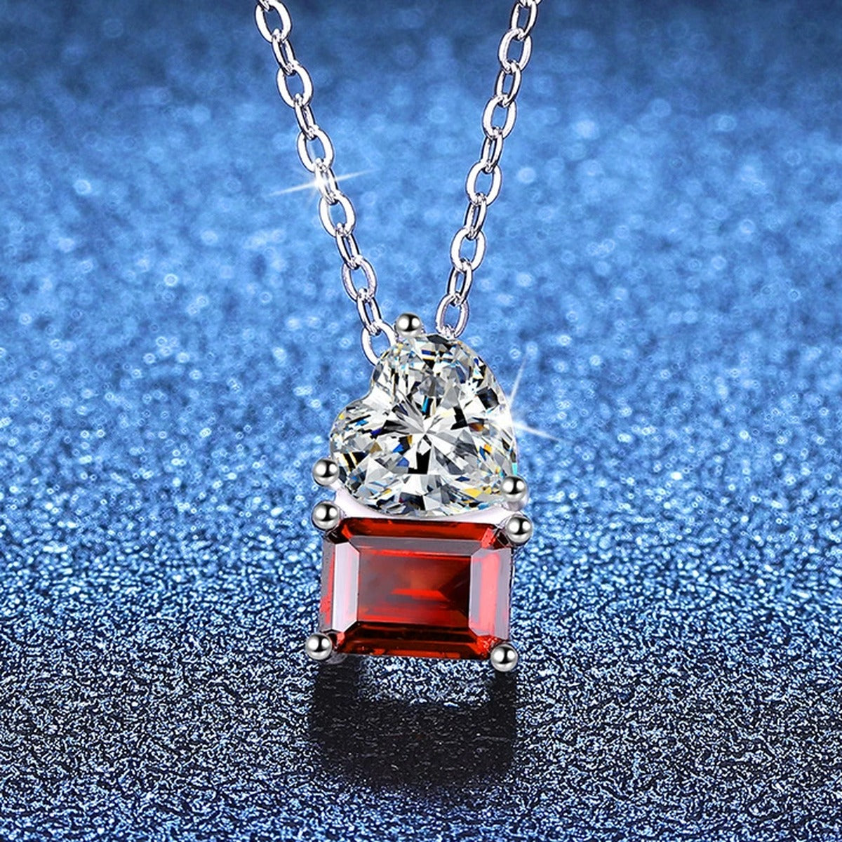 Heart Moissanite and Lab-Grown Gemstone Pendant Necklace in White Gold-Plated S925 Sterling Silver blue background angled view