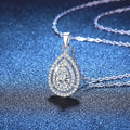 Pear Lab-Grown Gemstone and Moissanite Pendant Necklace in White Gold-Plated S925 Sterling Silver blue background product view