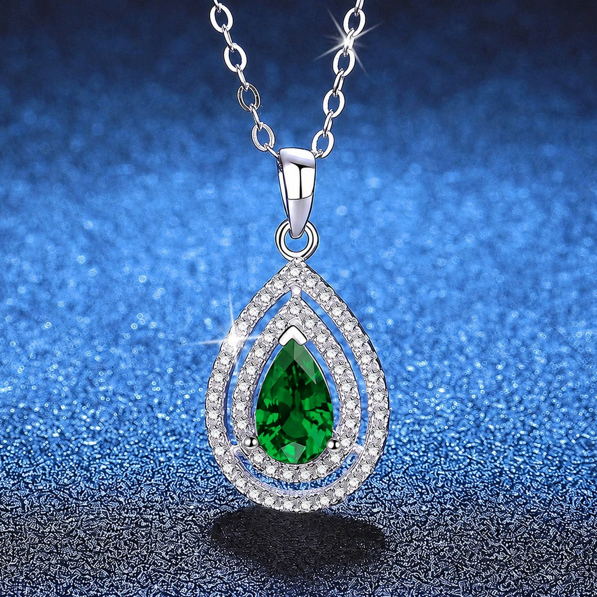 Pear Lab-Grown Gemstone and Moissanite Pendant Necklace in White Gold-Plated S925 Sterling Silver blue background styling view