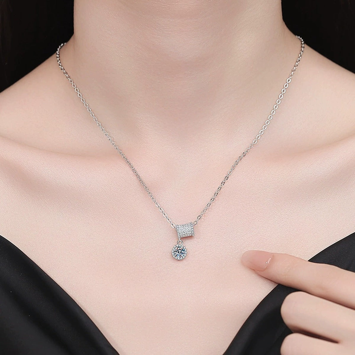 Square Station Moissanite Pendant Necklace with Cubic Zirconia in Platinum-Plated S925 Sterling Silver worn on neckline by model