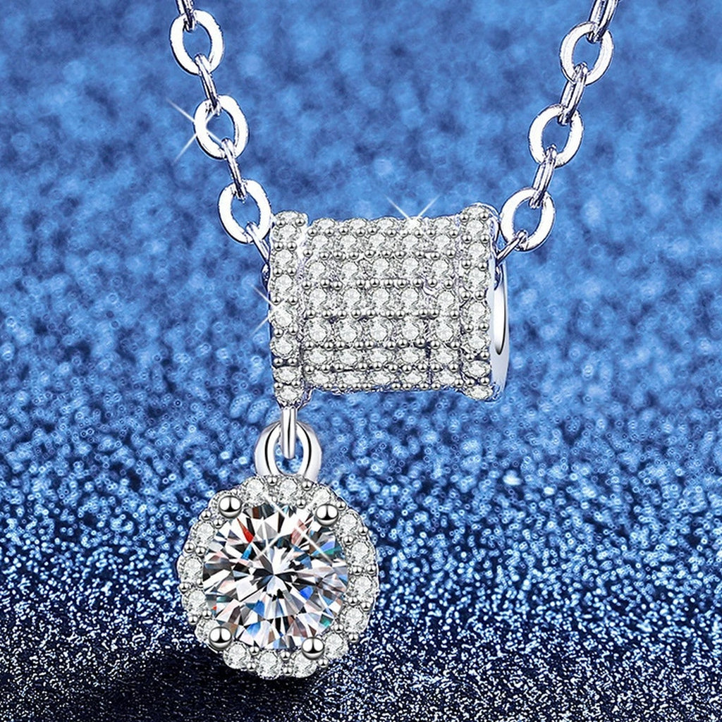 Square Station Moissanite Pendant Necklace with Cubic Zirconia in Platinum-Plated S925 Sterling Silver blue background angled view