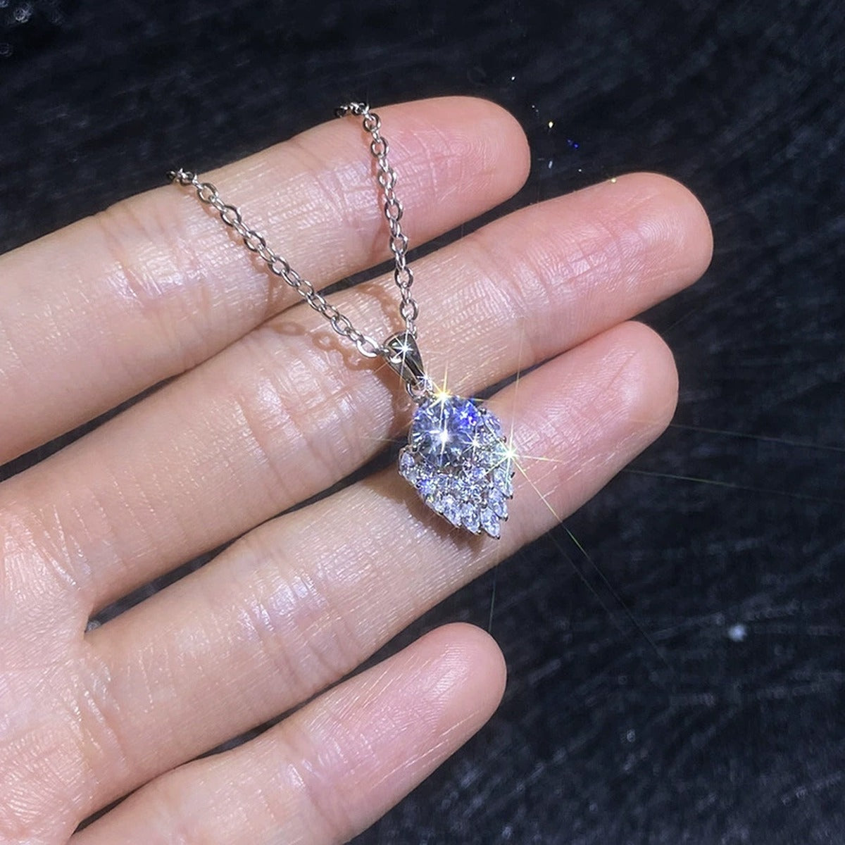 Pear Teardrop Moissanite Pendant Necklace with Cubic Zirconia in Platinum-Plated S925 Sterling Silver close-up product detail view