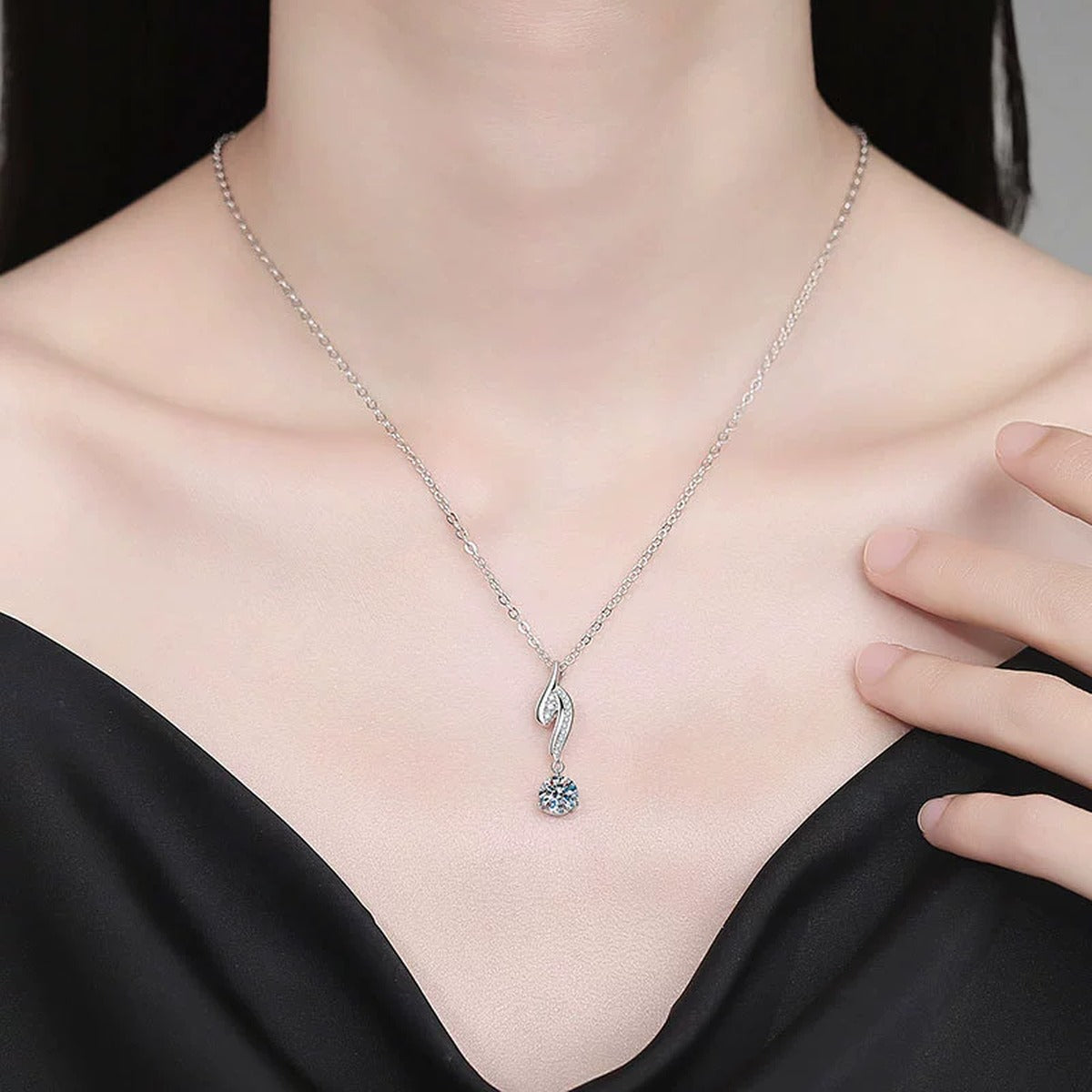 Long Hook Moissanite Pendant Necklace with Cubic Zirconia in Platinum-Plated S925 Sterling Silver worn on neckline by model