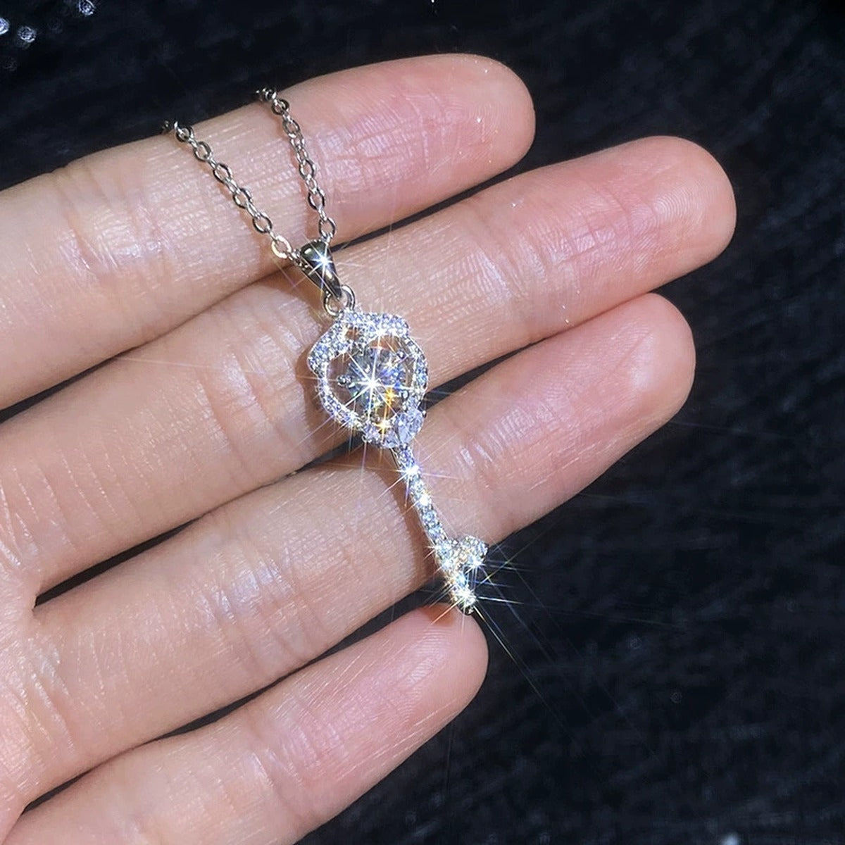 Slim Key Moissanite Pendant Necklace with Cubic Zirconia in Platinum-Plated S925 Sterling Silver close-up product detail view
