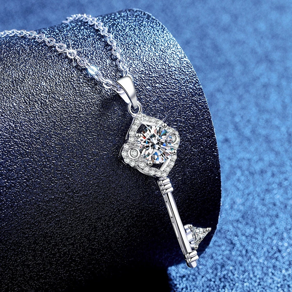 Pave Key Moissanite Pendant Necklace with Cubic Zirconia in Platinum-Plated S925 Sterling Silver blue background product view
