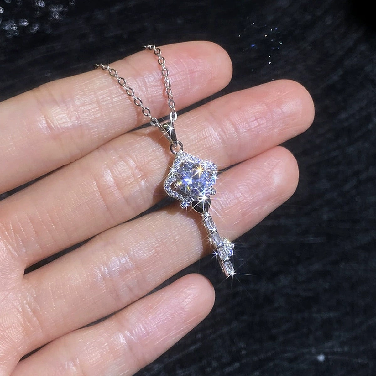 Ornate Key Moissanite Pendant Necklace with Cubic Zirconia in Platinum-Plated S925 Sterling Silver close-up product detail view