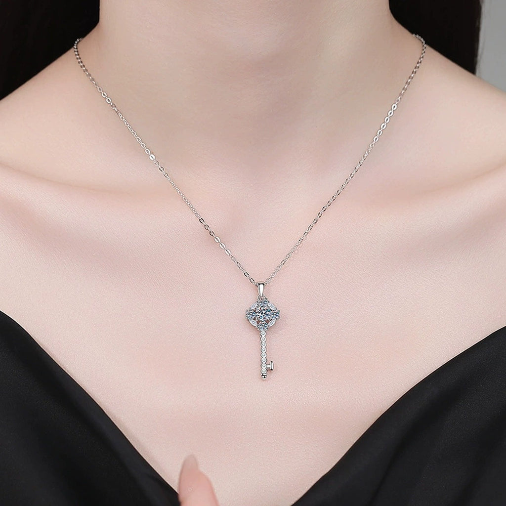Star Key Moissanite Pendant Necklace with Cubic Zirconia in Platinum-Plated S925 Sterling Silver worn on neckline by model